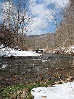 Big Spring Fork as it heads for the Elk River, just beyond the rail bridge.  Gauley Mountain, hoarfrosted, communes with the sky.<br /><i>This would be the discharge vicinity for the sewer plant.</i>