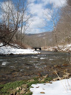 Big Spring Fork as it heads for the Elk River, just beyond the rail bridge.  Gauley Mountain, hoarfrosted, communes with the sky.<br /><i>This would be the discharge vicinity for the sewer plant.</i>