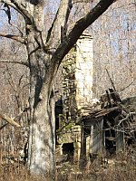 Silas Sharp's Home.  The chimney can be seen smoking in the old photo.